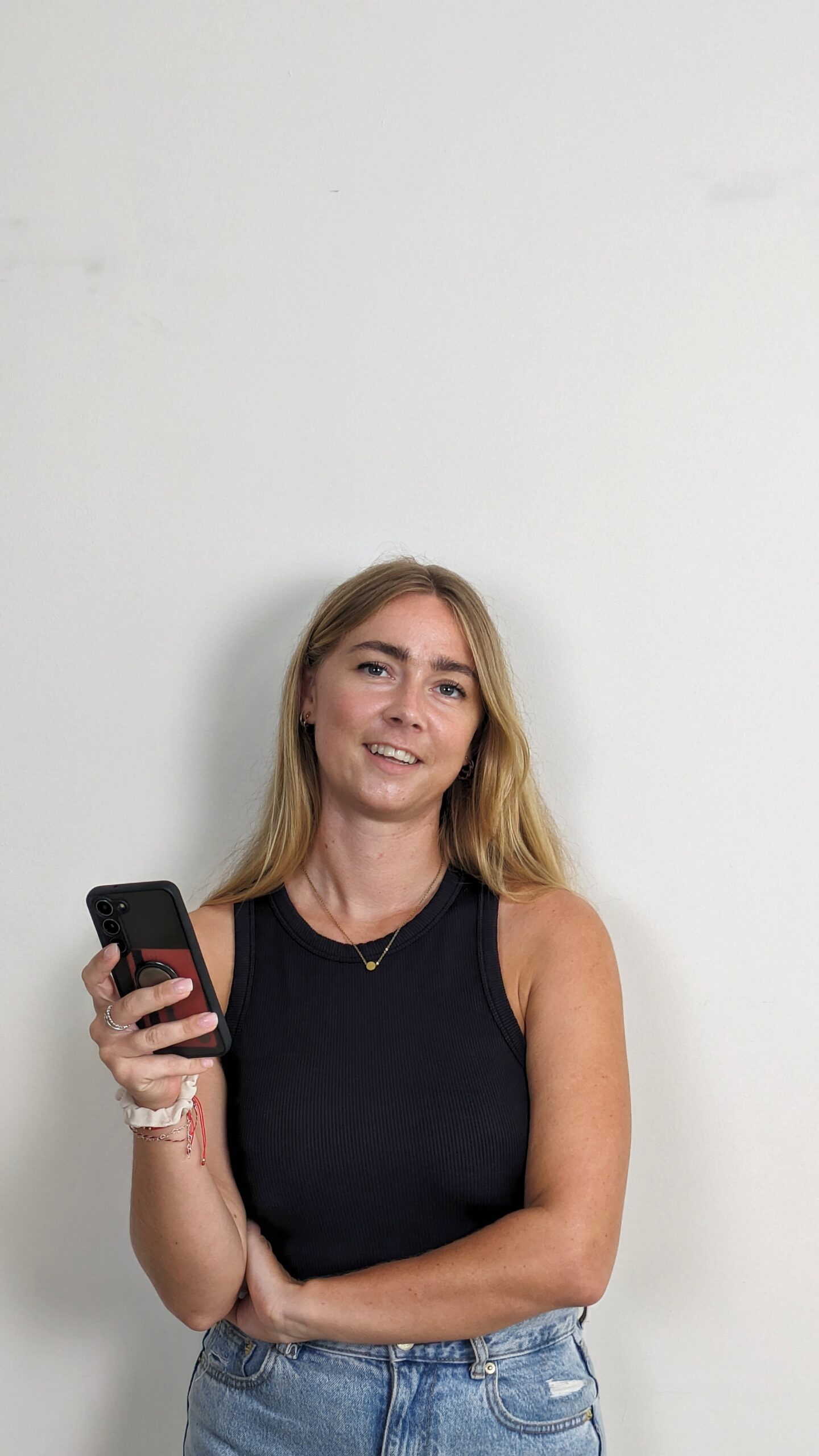 Sophie holding a phone